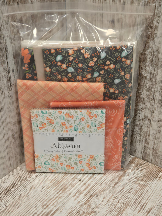 In Stitches Quilt Kit with Abloom fabric and pattern by Corey Yoder of Coriander Quilts
